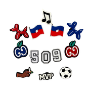 10er-Packung Stollennadeln für Clogs – Haiti