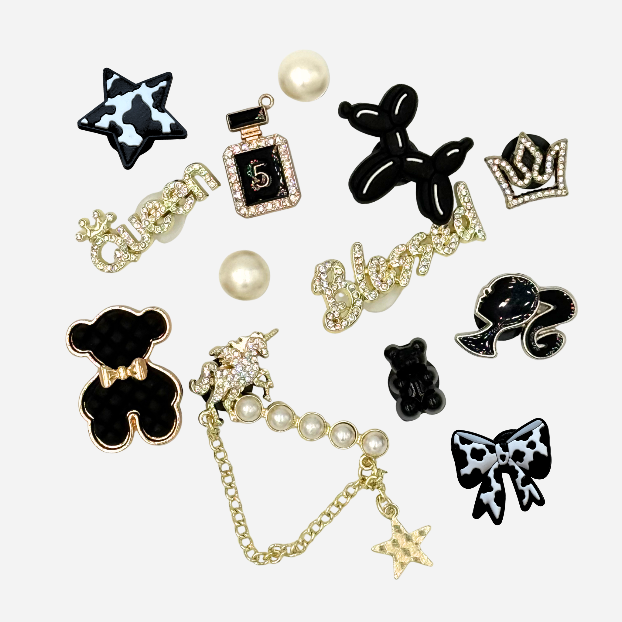 13er-Packung Stöpsel für Clogs – Schwarz &amp; Gold
