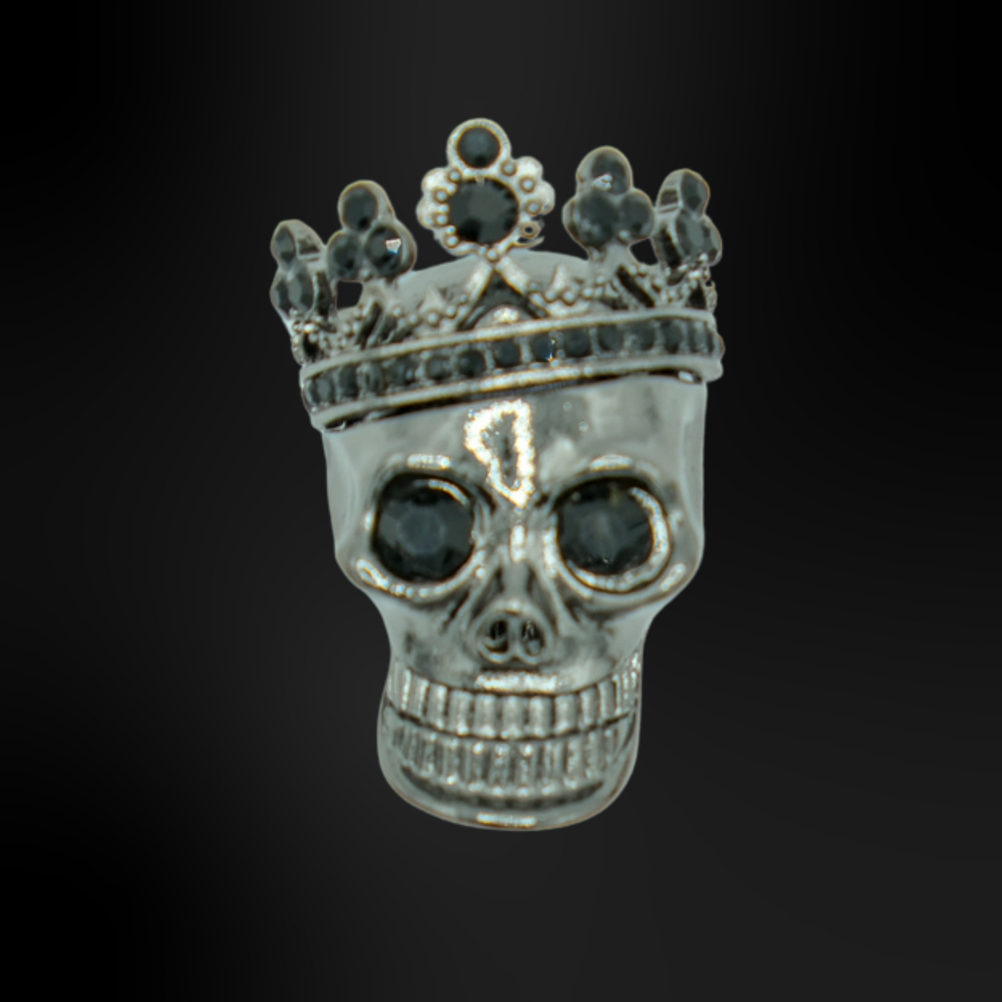 pins metallique tete de mort noir