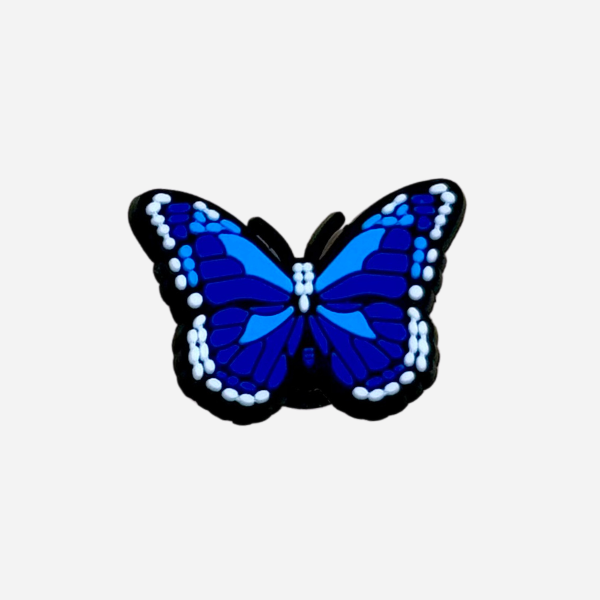 pins papillon bleu